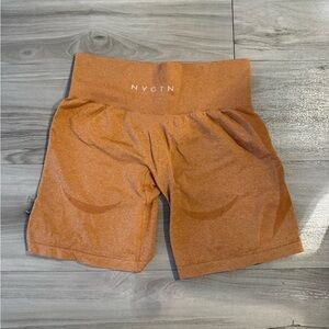 NVGTN Contour Seamless Shorts in Terracotta. Size: S